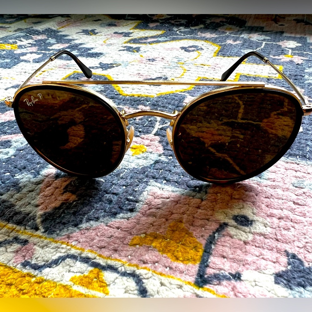 Barely worn custom Ray Ban sunglasses with leather detail on front